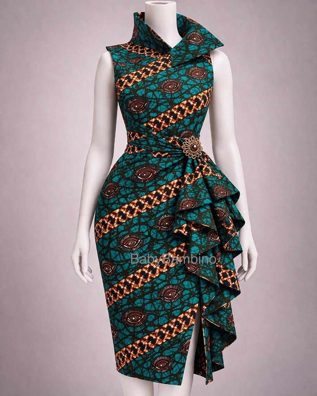 Green and copper Ankara patterned dress displayed on a white mannequin
